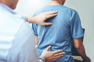 doctor treating spine