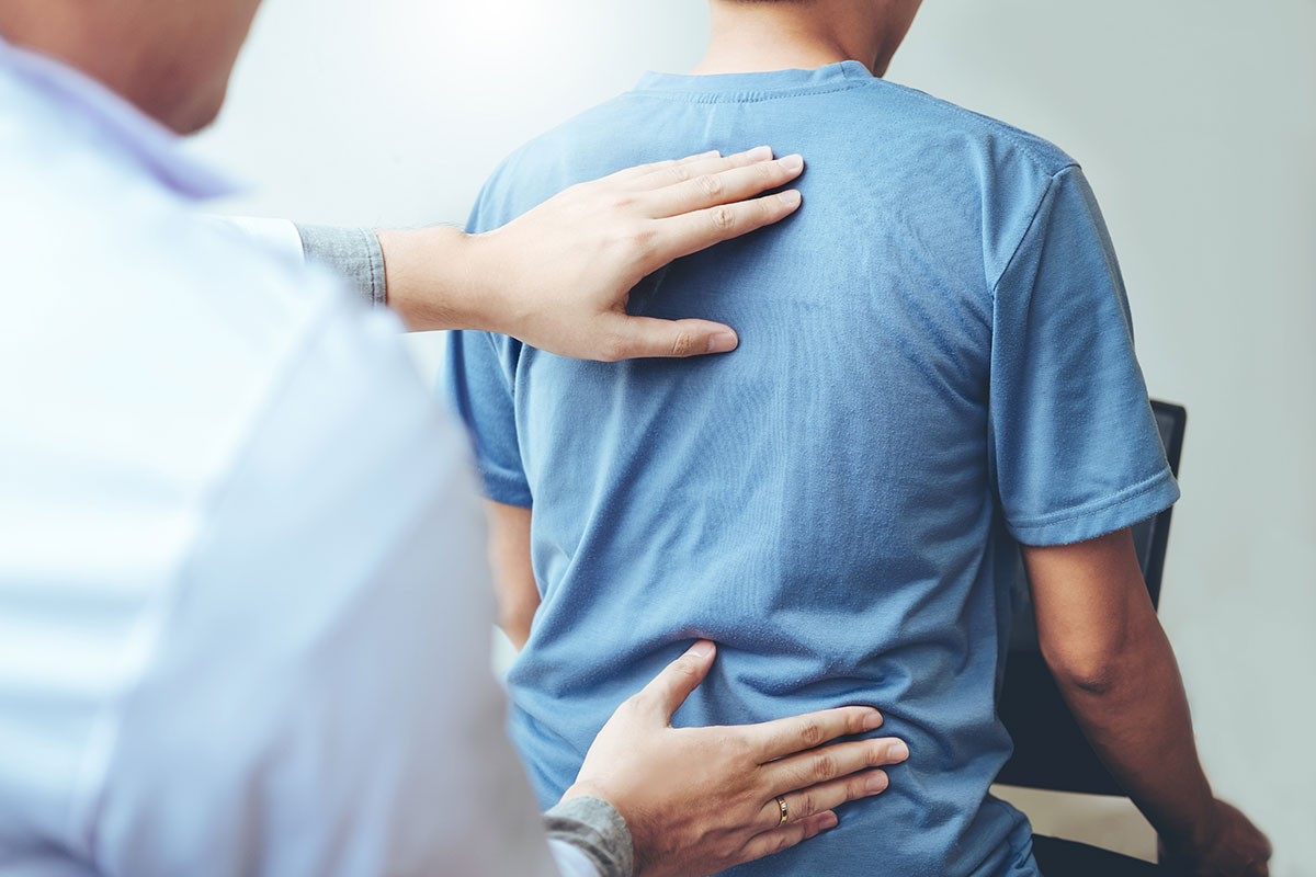 doctor treating spine